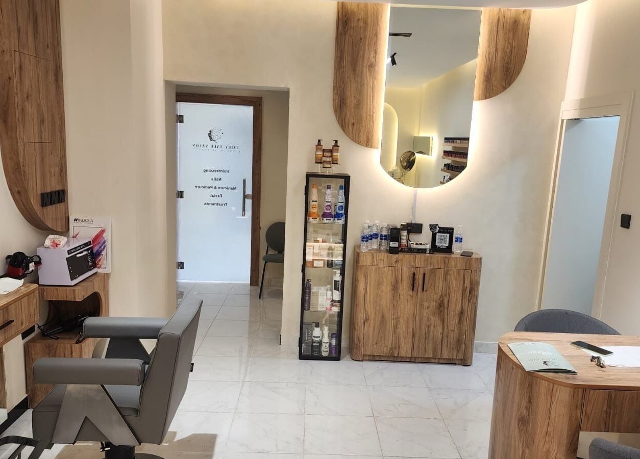 Elegant interior of FairyTale Salon at Muscat Grand Mall, Muscat, Muscat Governorate, OM with wooden accents.