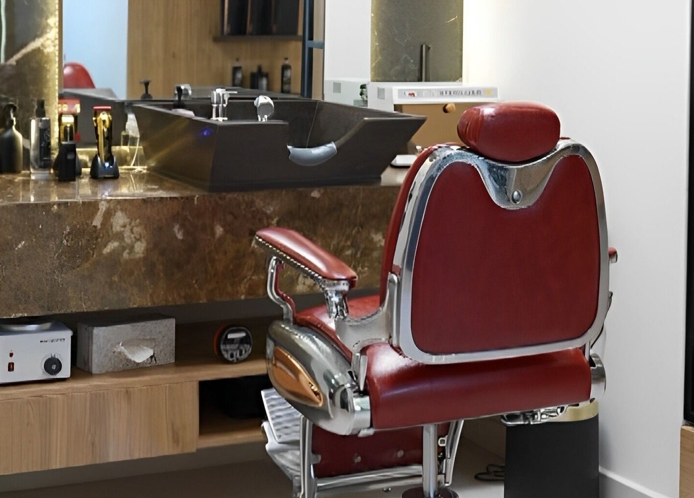 Vintage barber chair at Dax and Wax (Barbershop & Spa), Muscat, Muscat Governorate, OM, complementing modern decor.