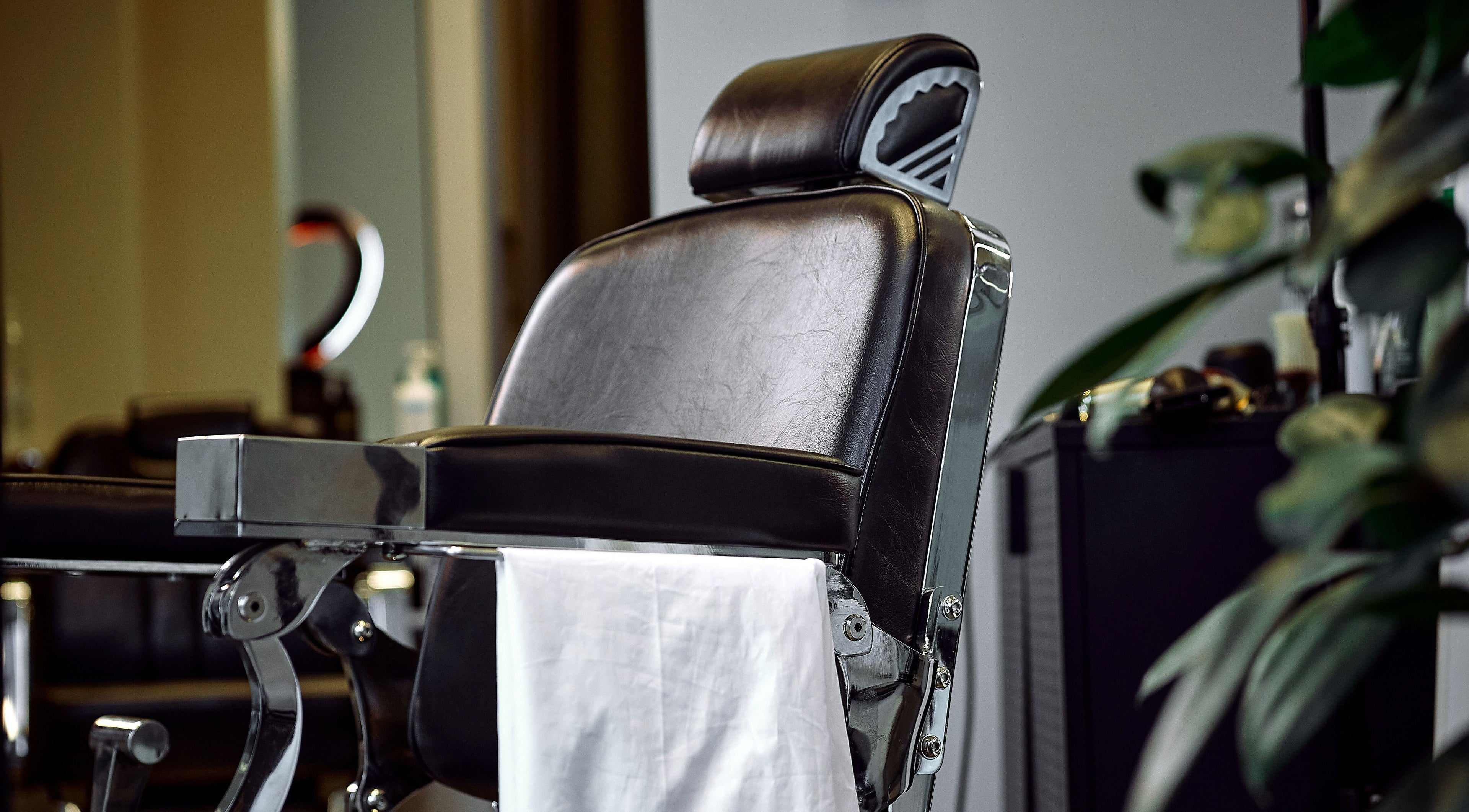 Sleek barber chair at Mave Barbershop | Rīga, offering premium grooming experience in Rīga, LV.