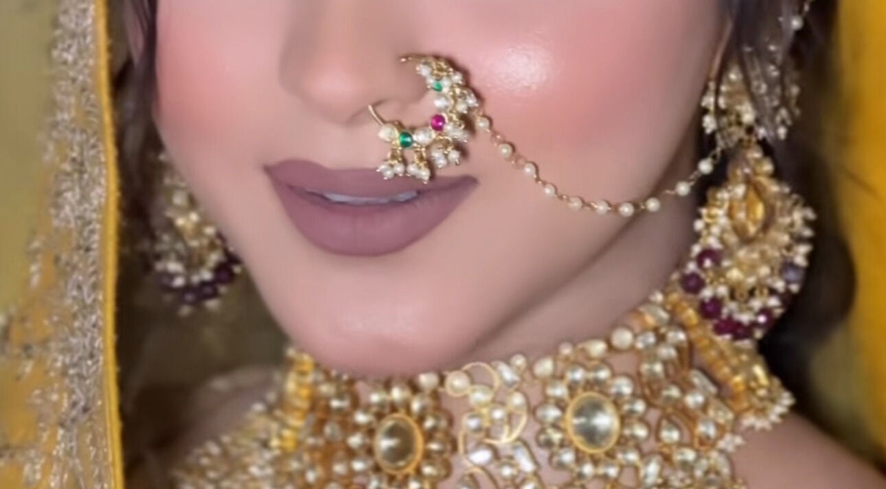 Grace Hair & Beauty in Stanwell, England, GB showcases exquisite bridal jewelry with intricate gold details.