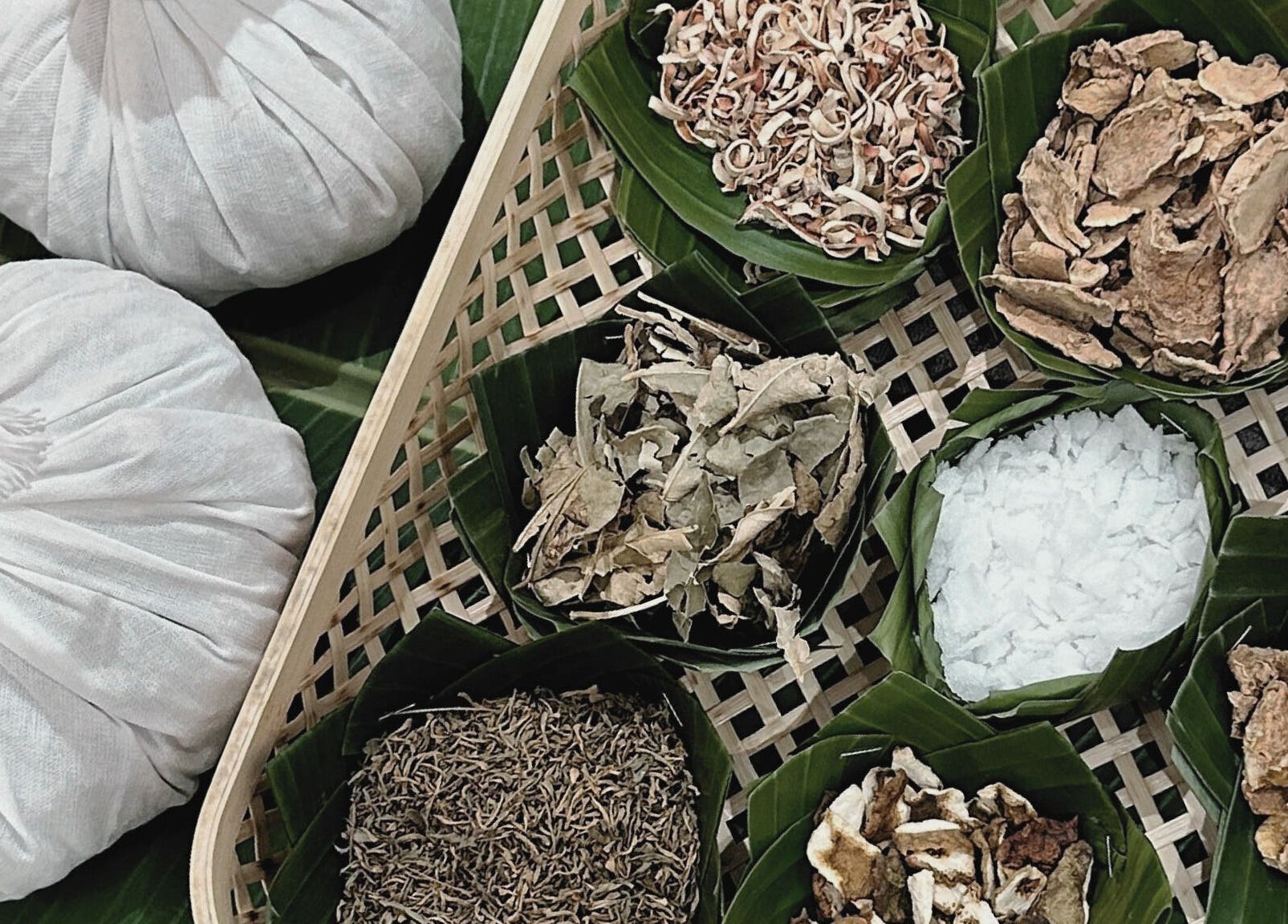 Traditional Thai massage herbs at Sabaai Sabaai, Raffles Place, SG enhance relaxation and wellness.