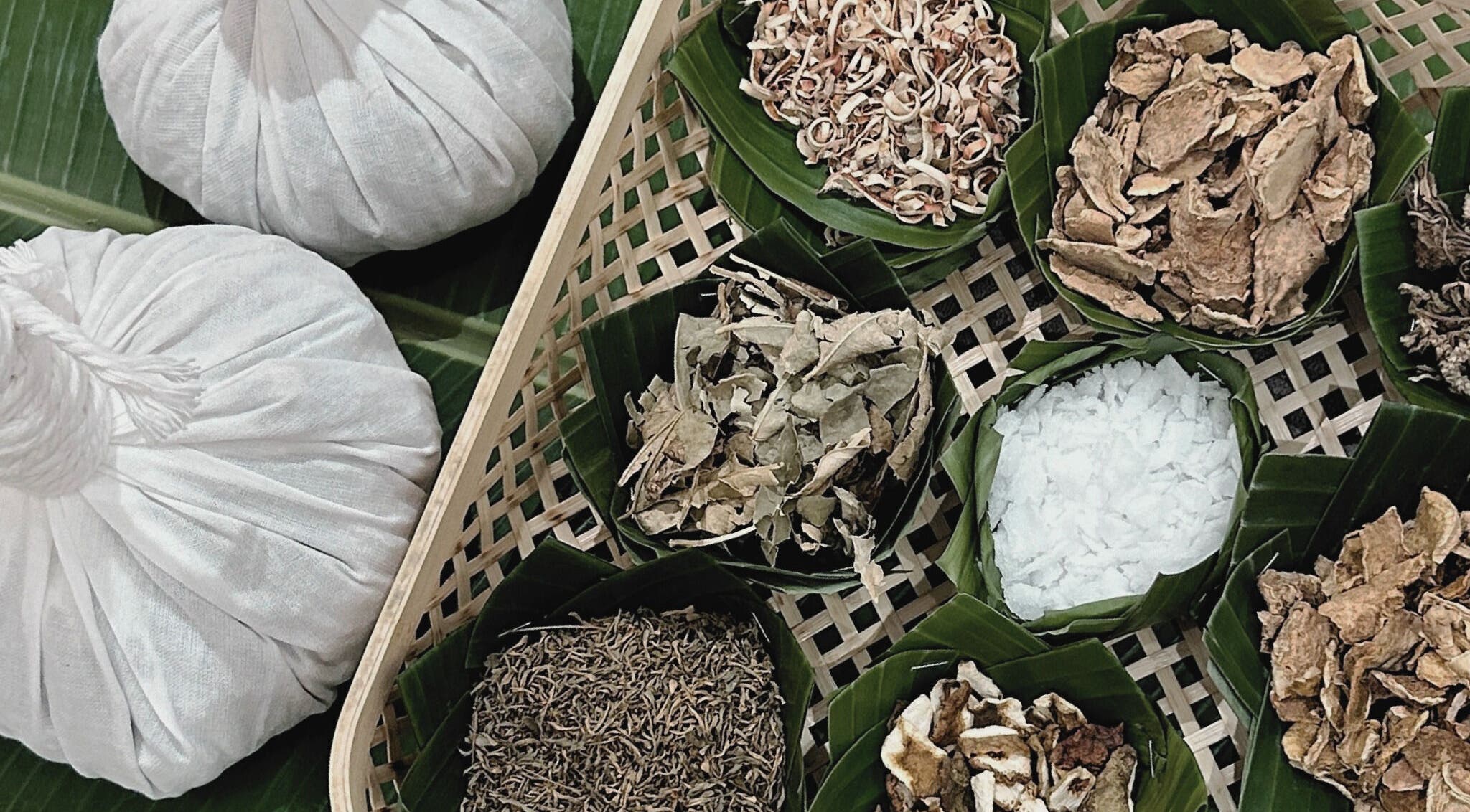 Traditional Thai massage herbs at Sabaai Sabaai, Raffles Place, SG enhance relaxation and wellness.