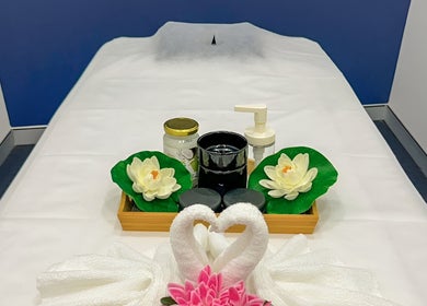 Tranquil massage room at Rockdale Remedial Thai Massage, Rockdale, New South Wales, AU with floral decor.