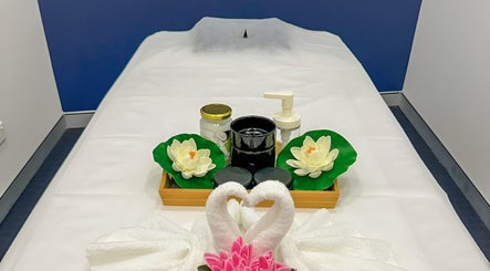 Tranquil massage room at Rockdale Remedial Thai Massage, Rockdale, New South Wales, AU with floral decor.