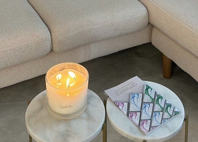 Inviting candle-lit table at Doctor Cliona in Ripon, England, GB, offering serene relaxation.