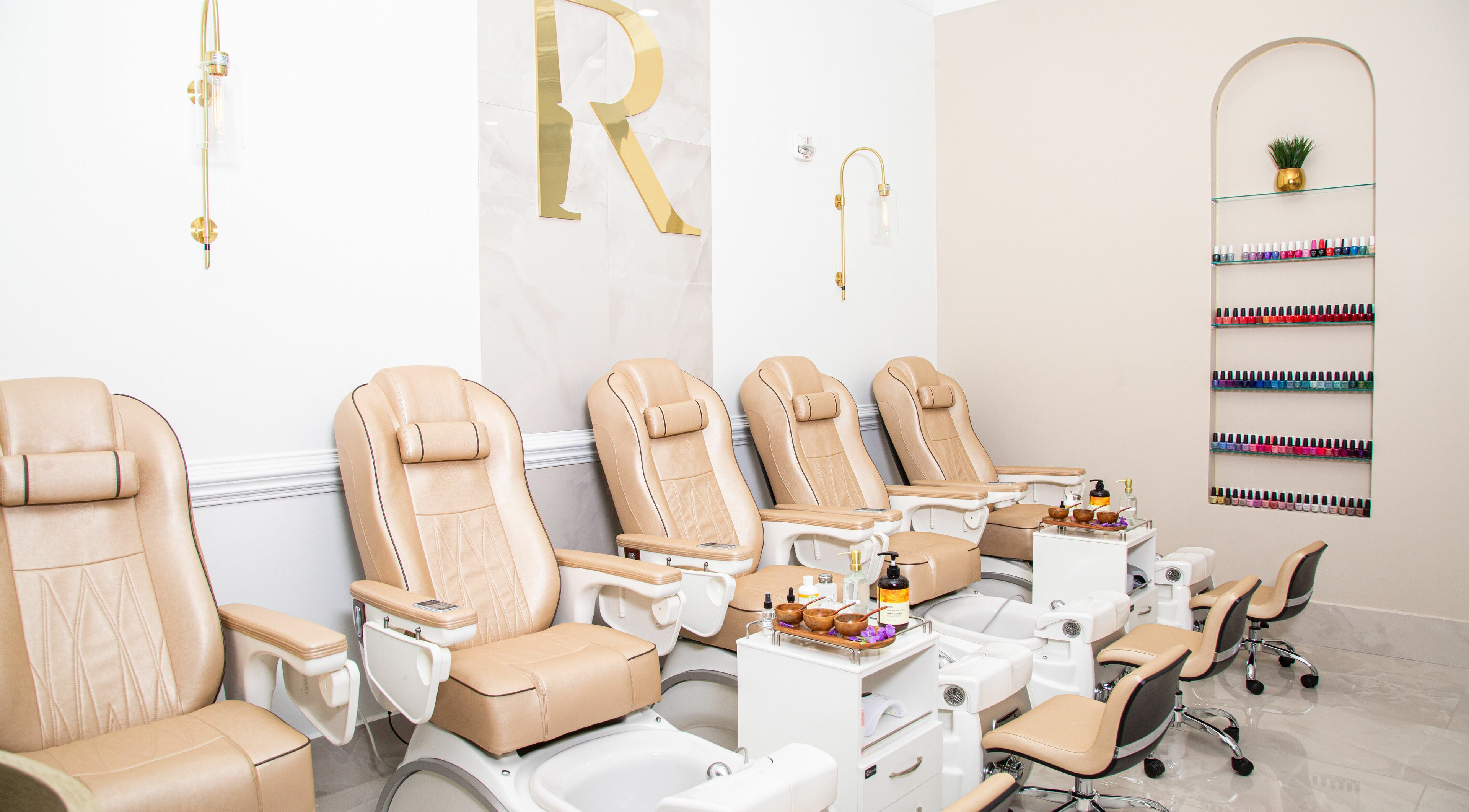 Elegant pedicure chairs at Royal Reflections Southpark Mall, Charlotte, North Carolina, US.