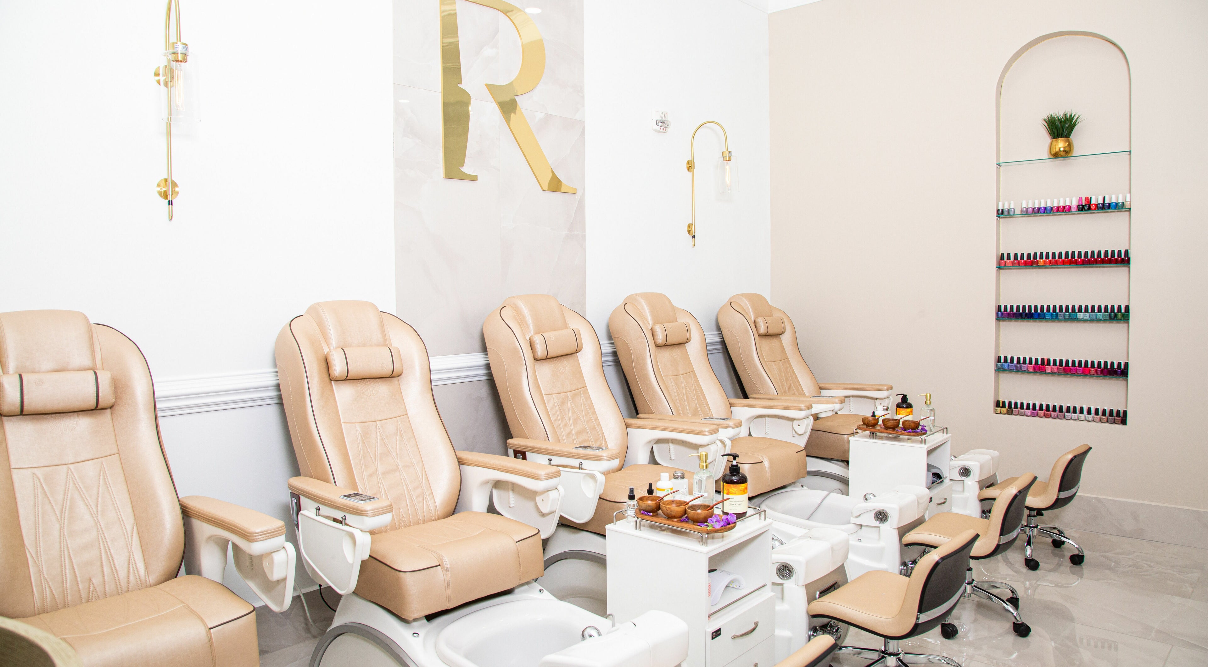 Elegant pedicure chairs at Royal Reflections Southpark Mall, Charlotte, North Carolina, US.