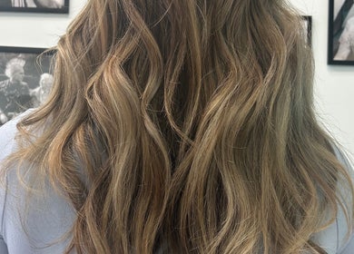 Beautiful wavy hairstyle at High Priestess Hair in St. Catharines, Ontario, CA, showcasing expert craftsmanship.