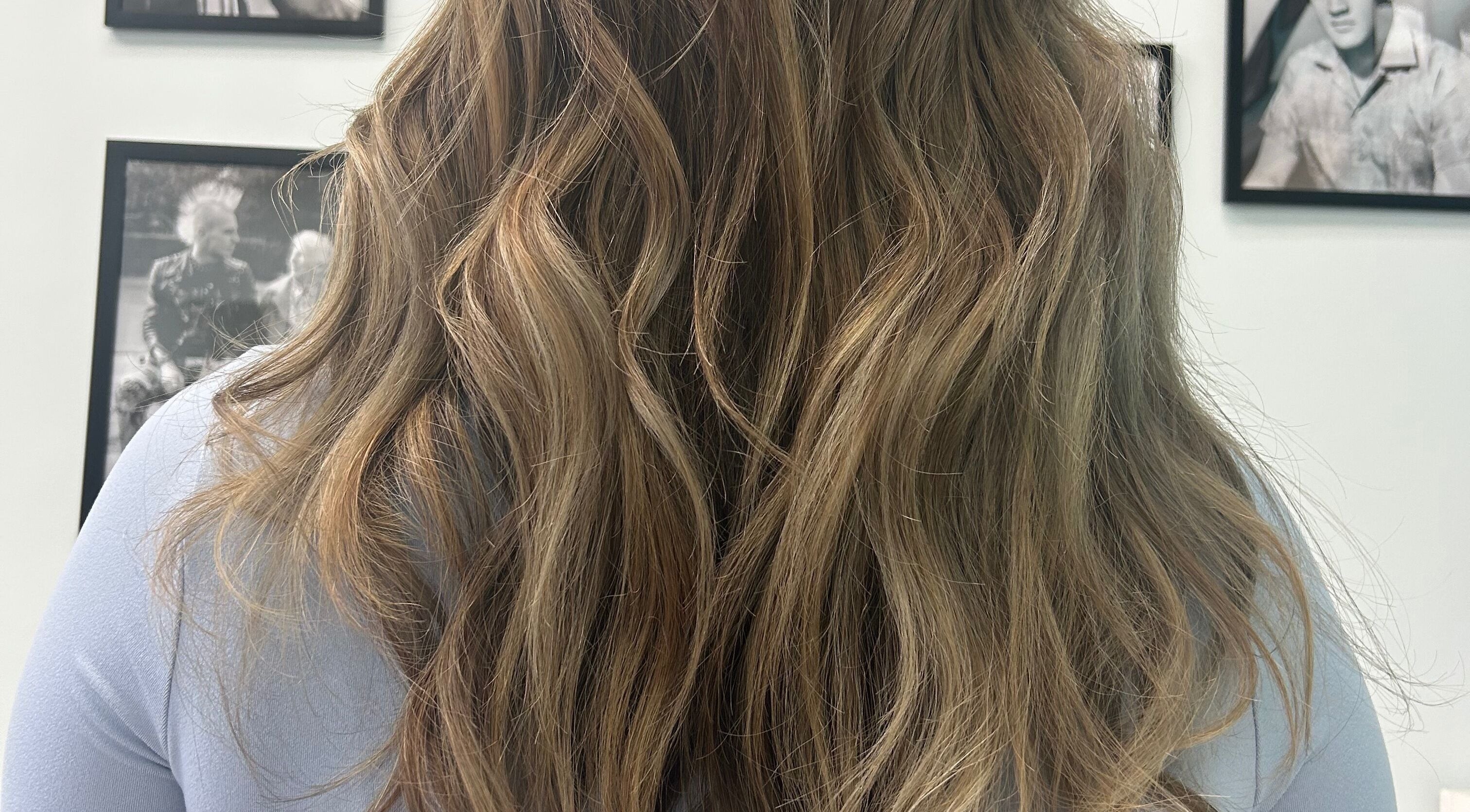 Beautiful wavy hairstyle at High Priestess Hair in St. Catharines, Ontario, CA, showcasing expert craftsmanship.