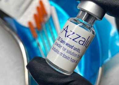 Azzalu vial held by gloved hand at Attvara Aesthetics, Great Kingshill, England, GB.