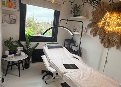 Bright treatment room at Attvara Aesthetics, Great Kingshill, England, GB with modern decor and cozy ambiance.