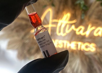 Close-up of a serum vial at Attvara Aesthetics, Great Kingshill, England, GB, showcasing luxurious wellness treatment.