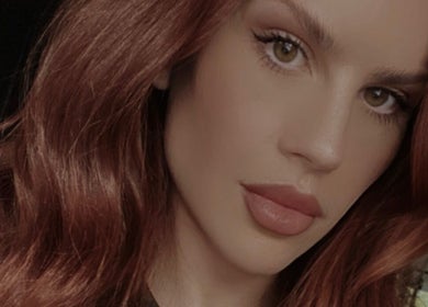 Close-up portrait at Attvara Aesthetics, Great Kingshill, England, showcasing vibrant beauty results.