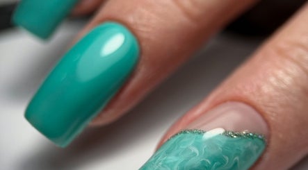 Turquoise nails with artistic design at F I A Nails, Beauty and Wellness, Diss, England, GB.