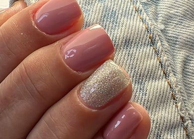 Glossy manicure with pink nails and a glitter accent at F I A Nails, Beauty and Wellness in Diss, England, GB.