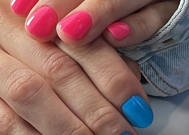 Colorful manicure at F I A Nails, Beauty and Wellness, Diss, England, GB. Featuring bright pink and blue shades.