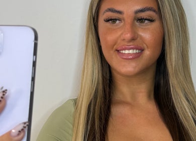 Person taking a selfie showcasing beautiful lashes at Mimi’s Studio & Academy, Bournemouth, England, GB.