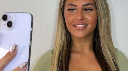 Person taking a selfie showcasing beautiful lashes at Mimi’s Studio & Academy, Bournemouth, England, GB.