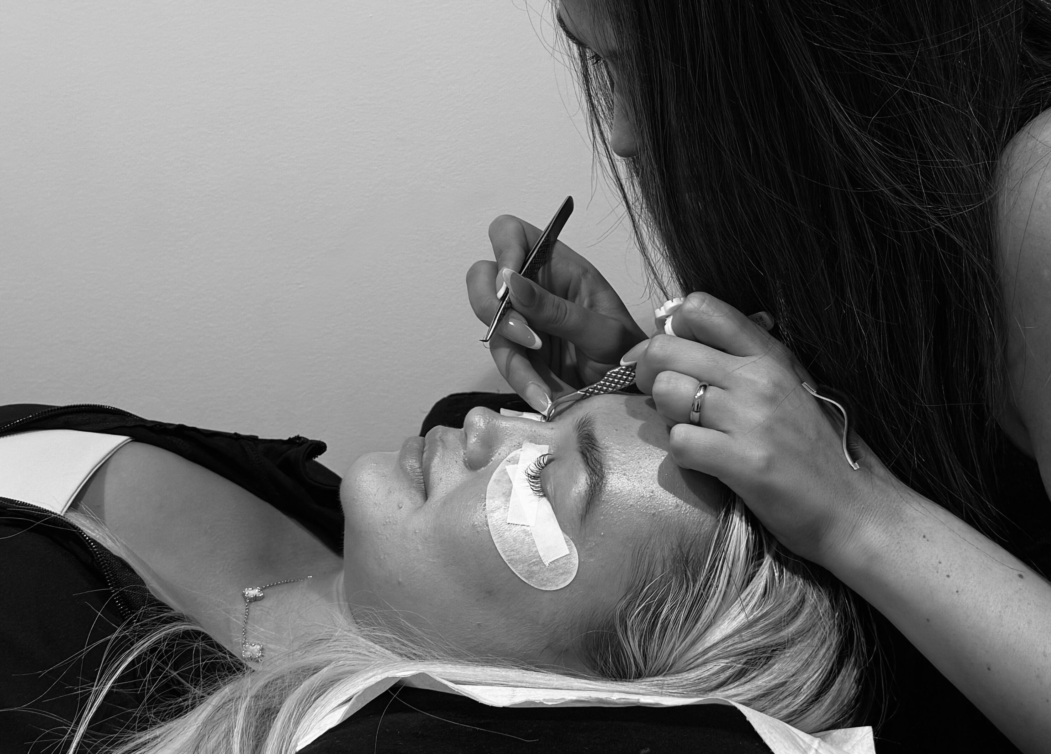 Lash extension being applied at Mimi’s Studio & Academy, Bournemouth, England, GB highlighting precision and care.