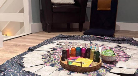 Soothing setup at Be Well Massage & Holistic Therapies, Gleno, Northern Ireland, GB with oils and teas.