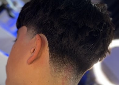 Crisp fade hairstyle crafted at Kasboi Cuts in West End, Queensland, AU.