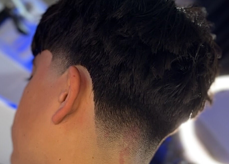 Crisp fade hairstyle crafted at Kasboi Cuts in West End, Queensland, AU.