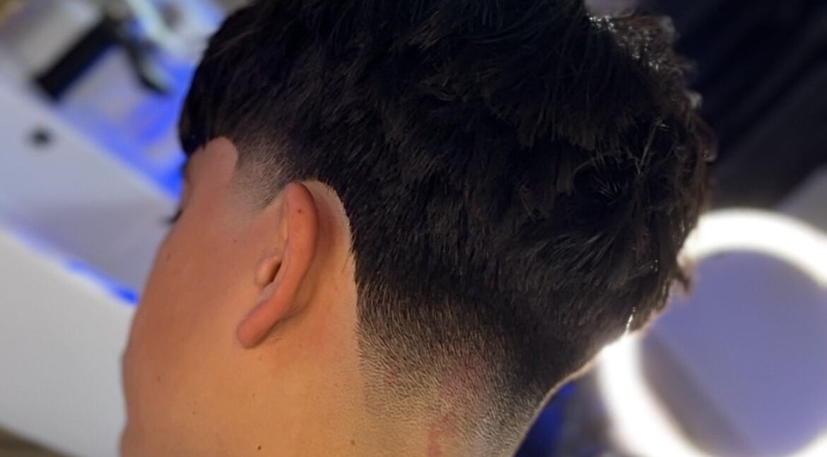 Crisp fade hairstyle crafted at Kasboi Cuts in West End, Queensland, AU.