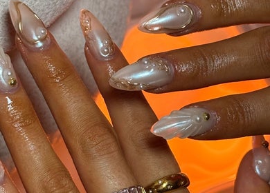 Intricate nail art featuring pearl designs at Gemi Nailz, Cleveland, Queensland, AU.