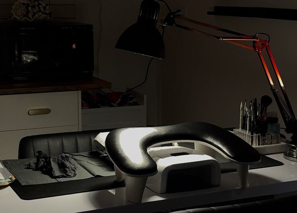 Inviting nail care setup at Gemi Nailz, Cleveland, Queensland, AU, featuring tools and modern lighting.