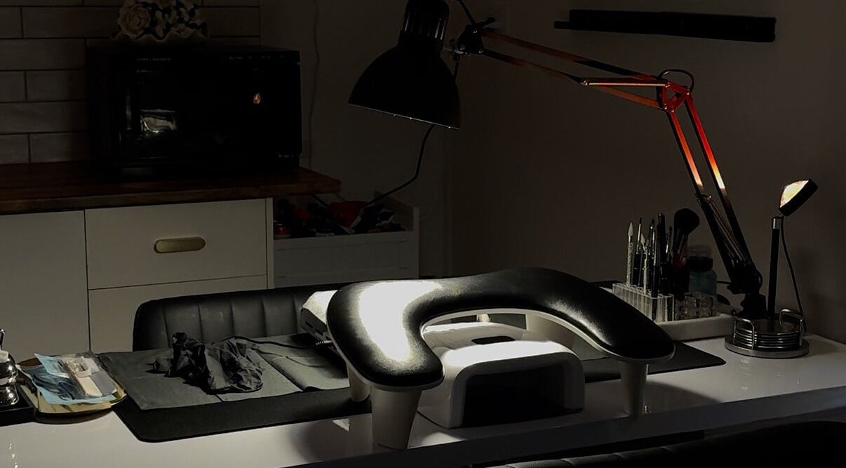 Inviting nail care setup at Gemi Nailz, Cleveland, Queensland, AU, featuring tools and modern lighting.