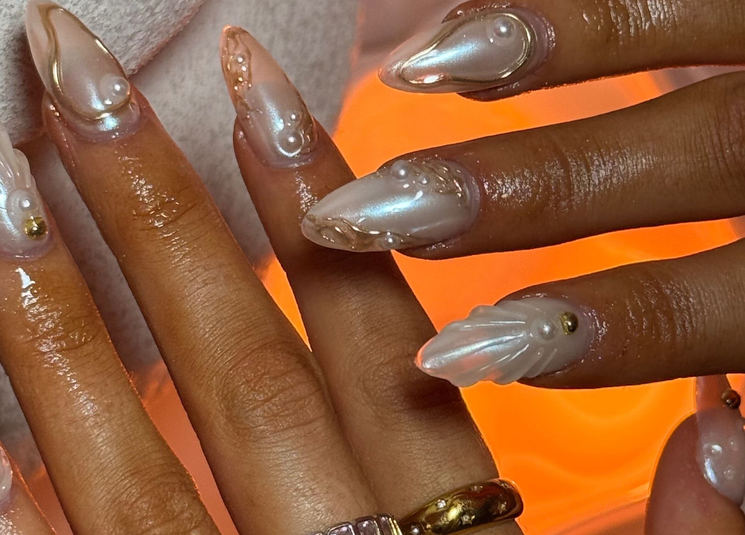 Beautiful pearl-accented nails at Gemi Nailz in Cleveland, Queensland, AU, showcasing exquisite nail art design.