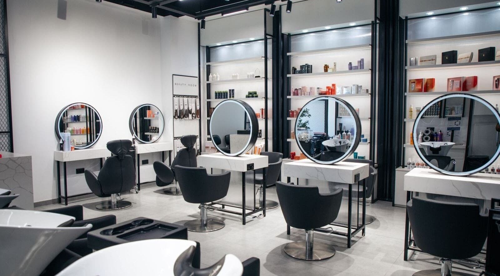 Modern salon chairs and mirrors at Beauty Room Salon & Spa | Nad Al Sheba. Located in Dubai, Dubai, AE.