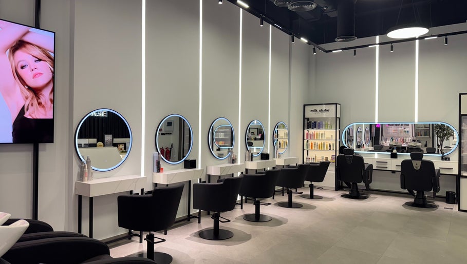 Sleek interior of Beauty Room Salon and Spa | Al Khwaneej in Dubai, Dubai, AE with modern styling stations.