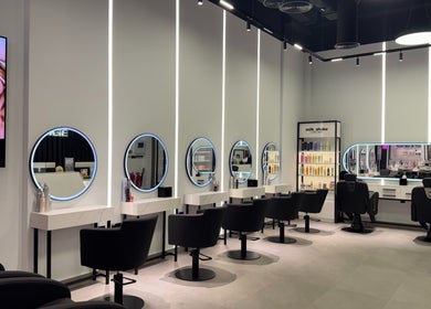 Sleek interior of Beauty Room Salon and Spa | Al Khwaneej in Dubai, Dubai, AE with modern styling stations.
