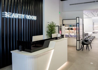 Modern reception at Beauty Room Salon & Spa | Al Khwaneej, Dubai, Dubai, AE with sleek black paneling.