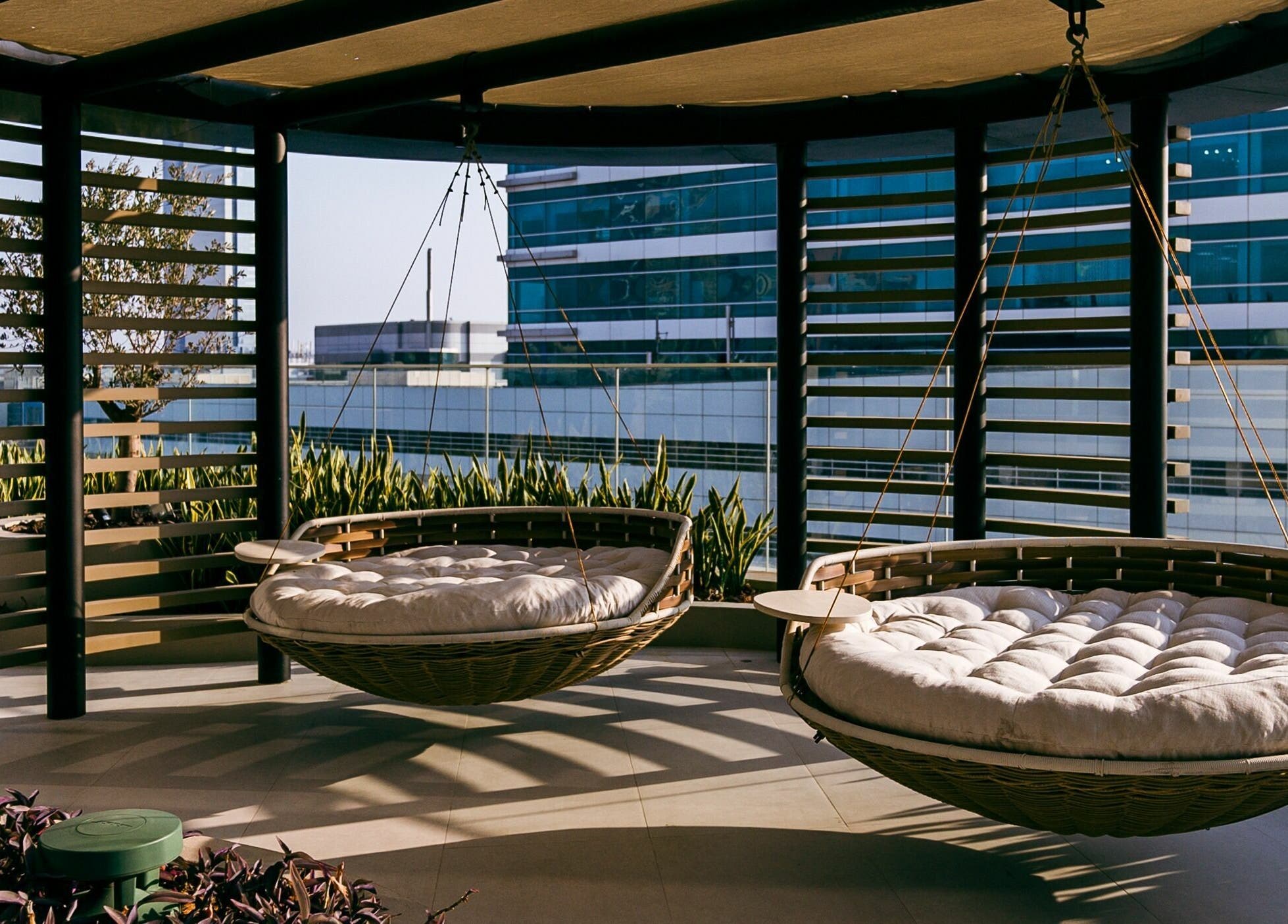 Luxury hanging beds at Blaj Spa in Dubai, AE, offering a serene and modern relaxation area.
