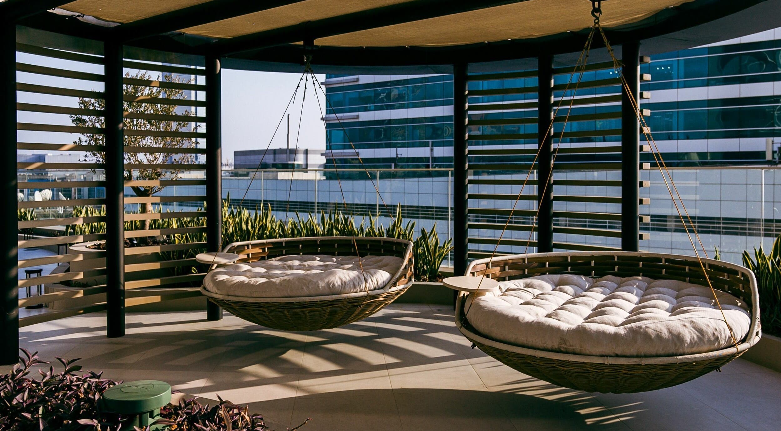 Luxury hanging beds at Blaj Spa in Dubai, AE, offering a serene and modern relaxation area.