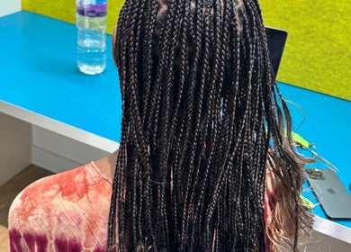 Detailed view of stylish braids at Ennie's Braids LTD, London, England, GB.