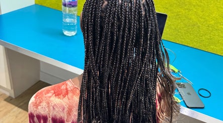 Detailed view of stylish braids at Ennie's Braids LTD, London, England, GB.