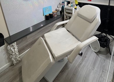 Luxurious treatment chair at MG Aesthetics Lounge, Bristol, England, GB, for ultimate relaxation.