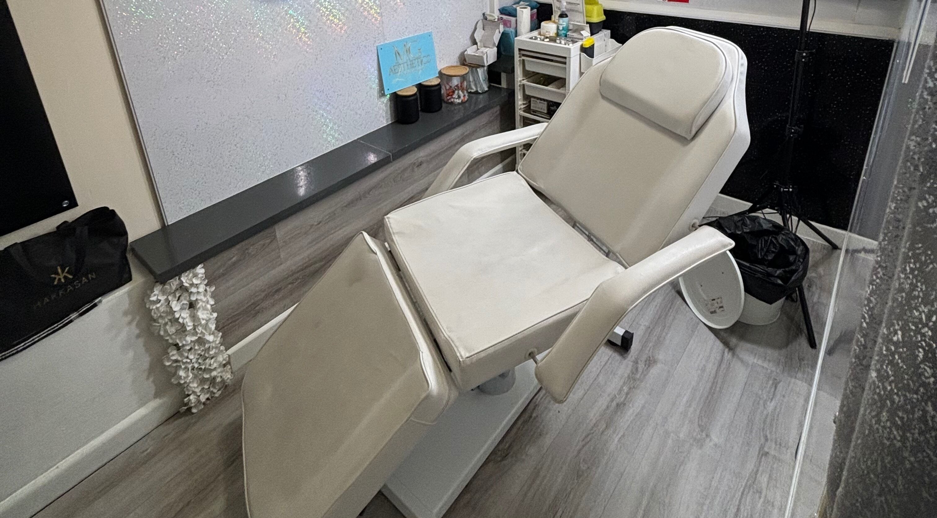 Luxurious treatment chair at MG Aesthetics Lounge, Bristol, England, GB, for ultimate relaxation.