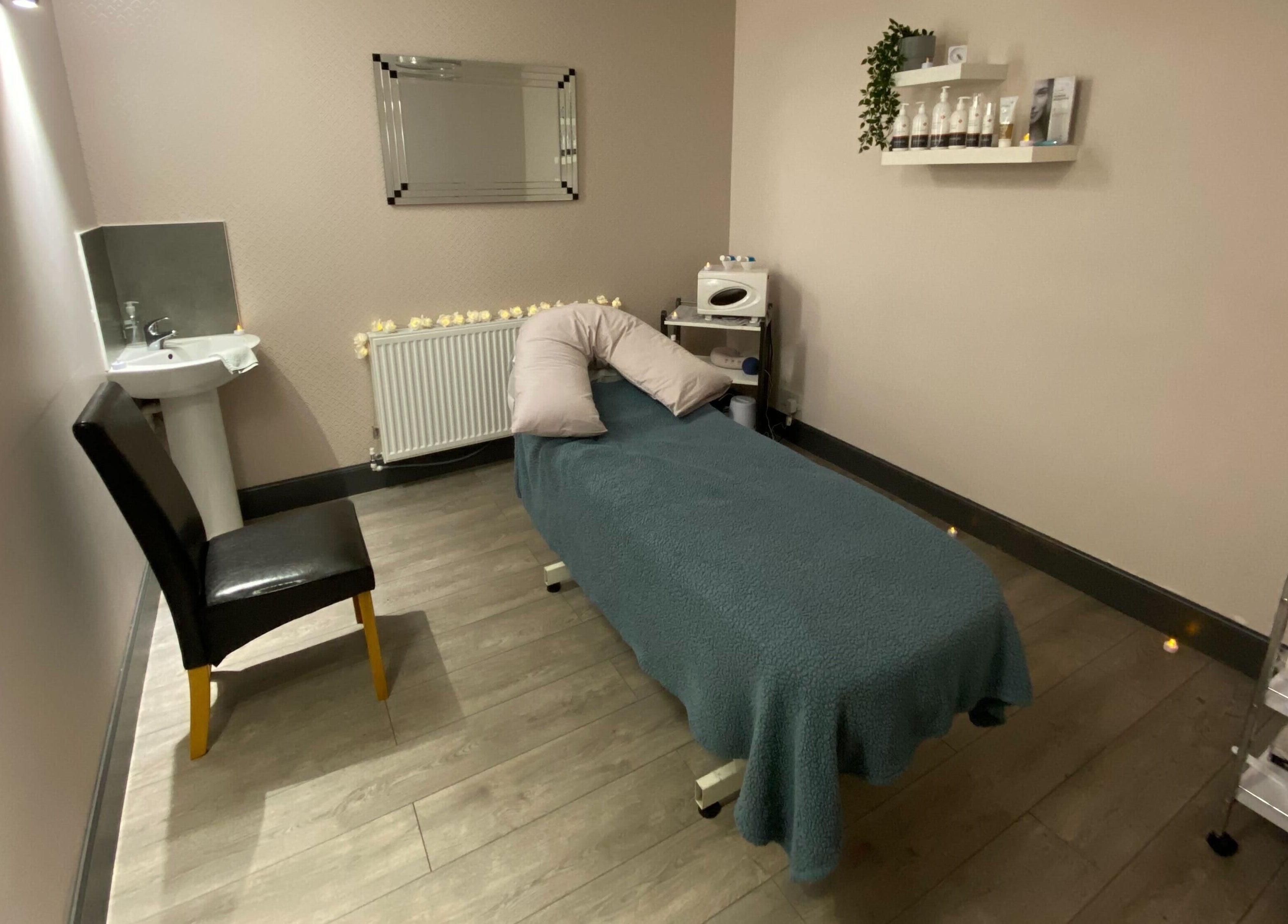 Relaxing therapy room at Mind & Body Studio in Kirkcaldy, Scotland, GB, featuring tranquil massage bed.