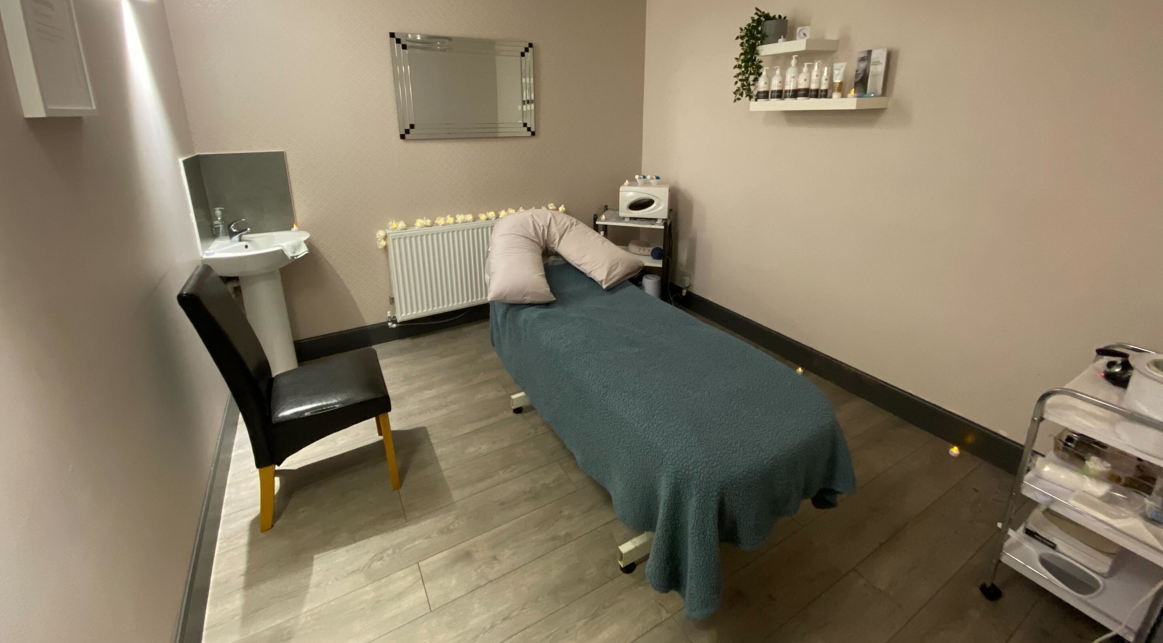 Relaxing therapy room at Mind & Body Studio in Kirkcaldy, Scotland, GB, featuring tranquil massage bed.