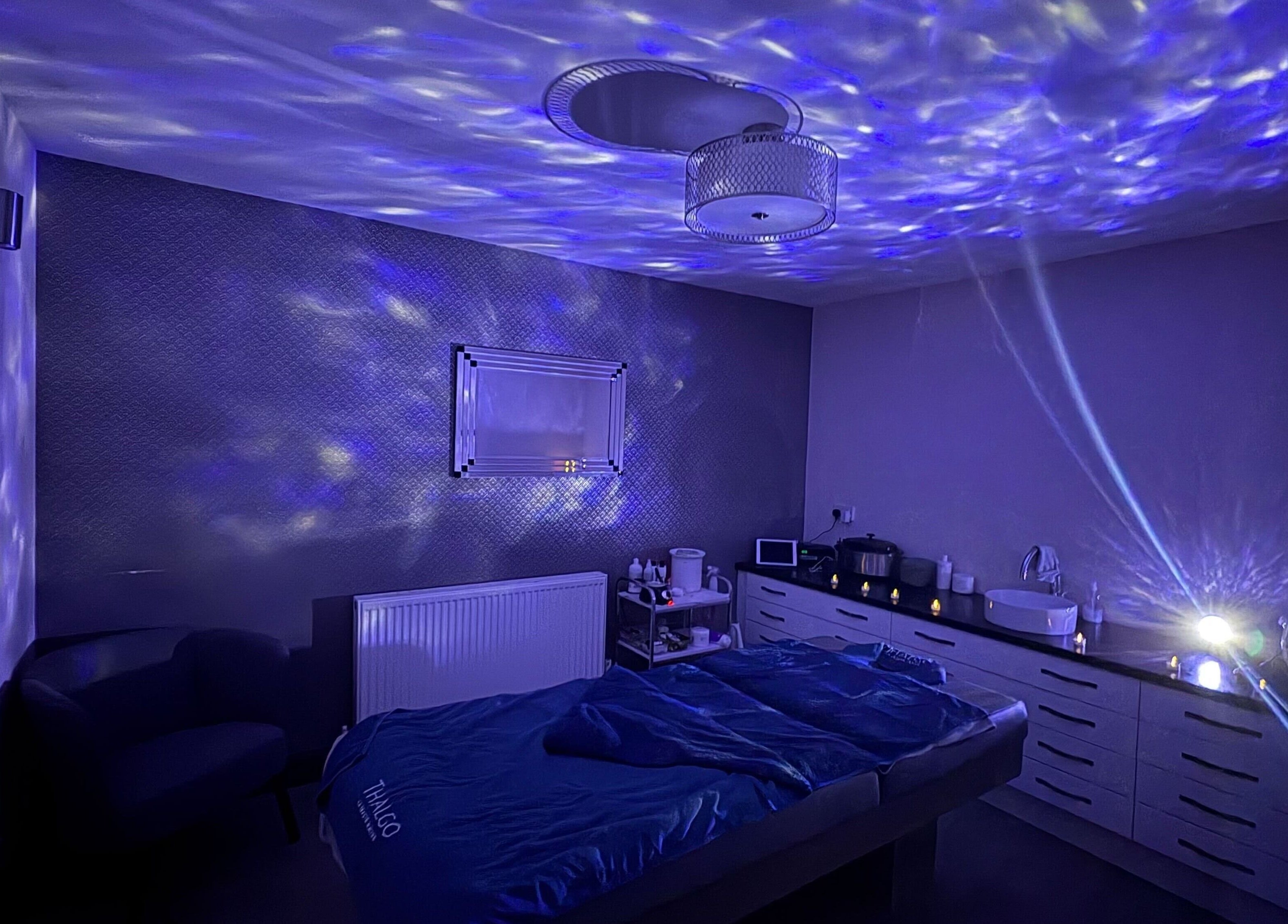 Relaxing therapy room at Mind & Body Studio with ambient lighting in Kirkcaldy, Scotland, GB.