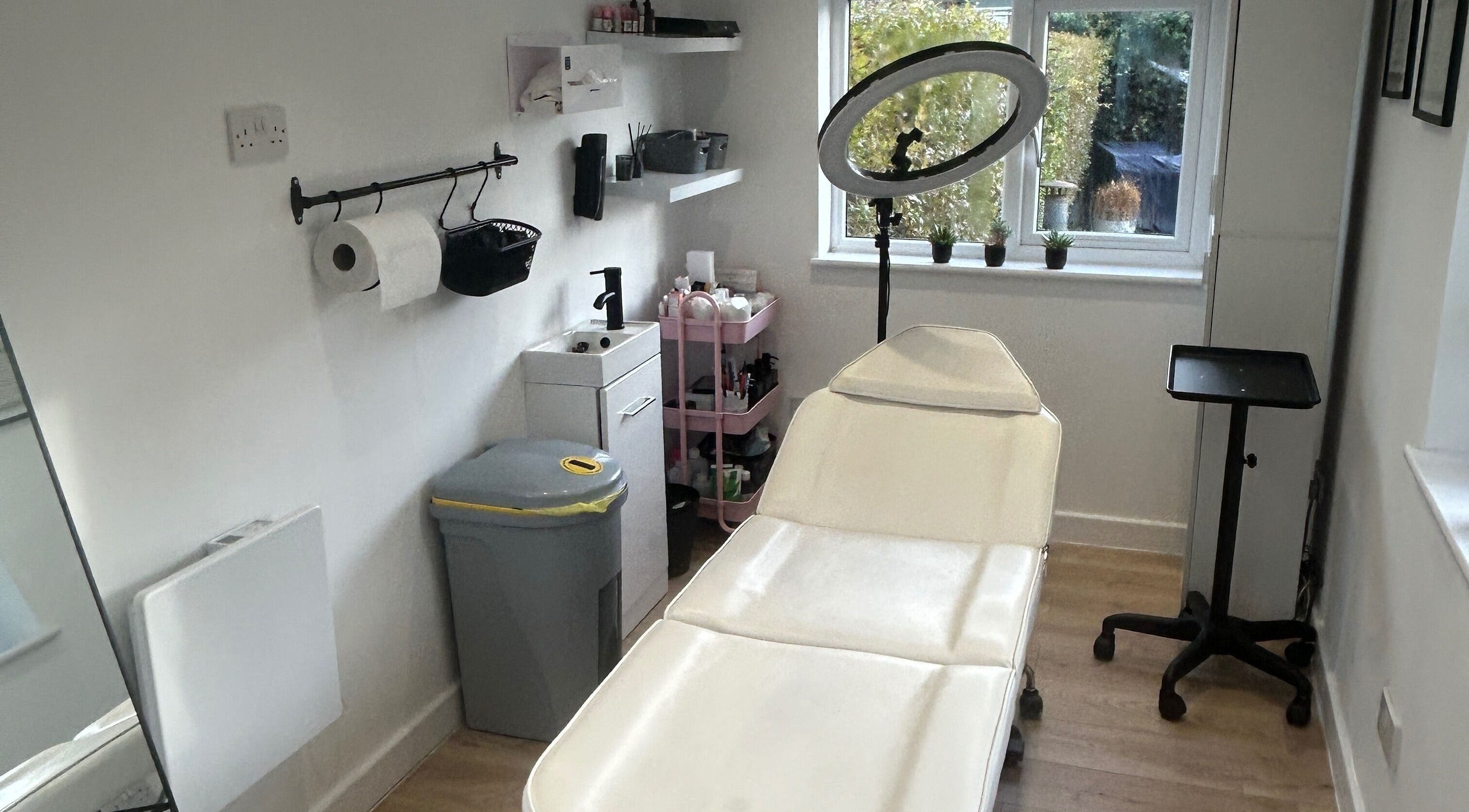 Professional treatment room at Dayna Louise, Leeds, England, GB, featuring a comfortable spa bed and soothing decor.