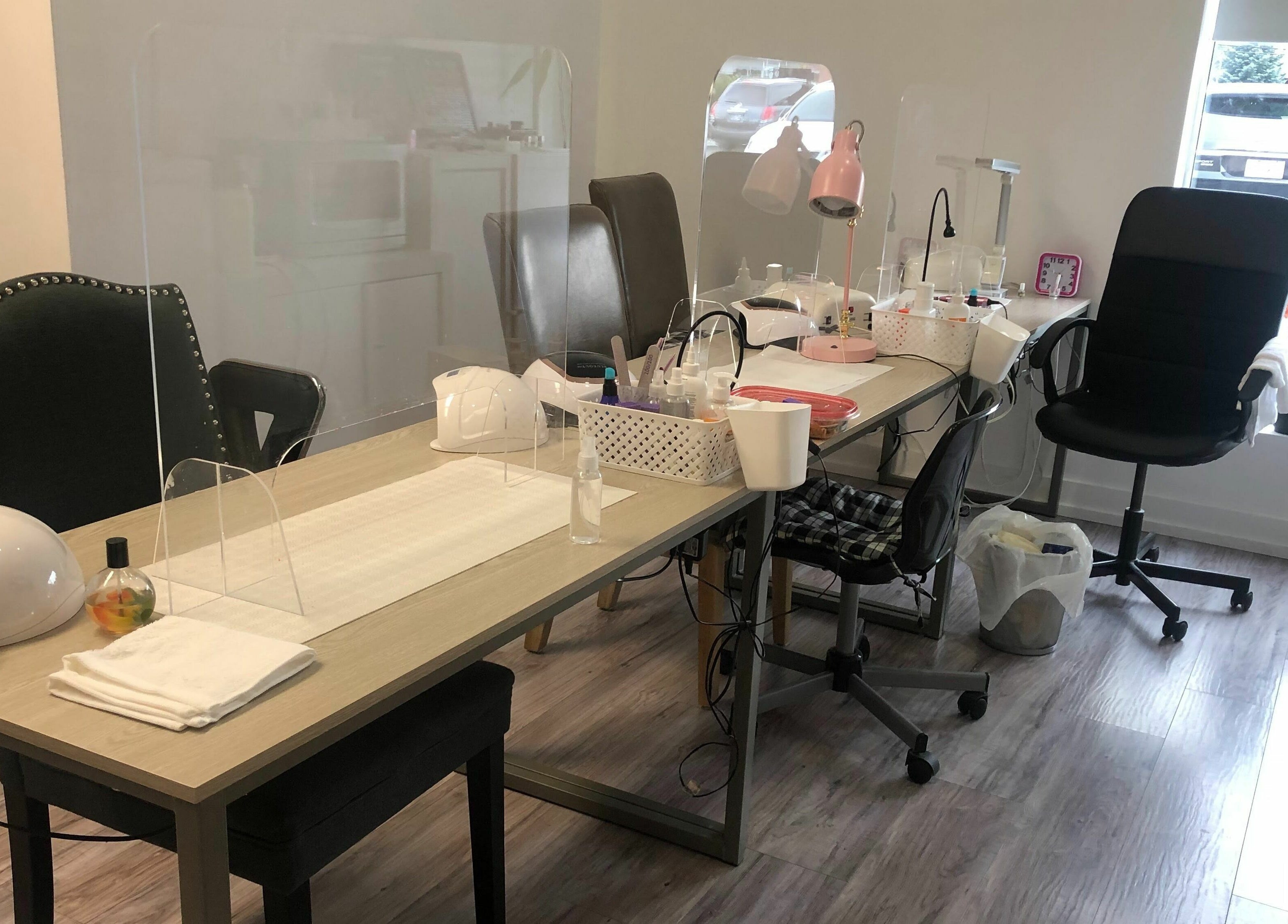 Modern nail stations at Bisoux Beauty Bar | Vaudreuil, Vaudreuil-Dorion, Québec, CA, showcasing a clean, elegant setup.