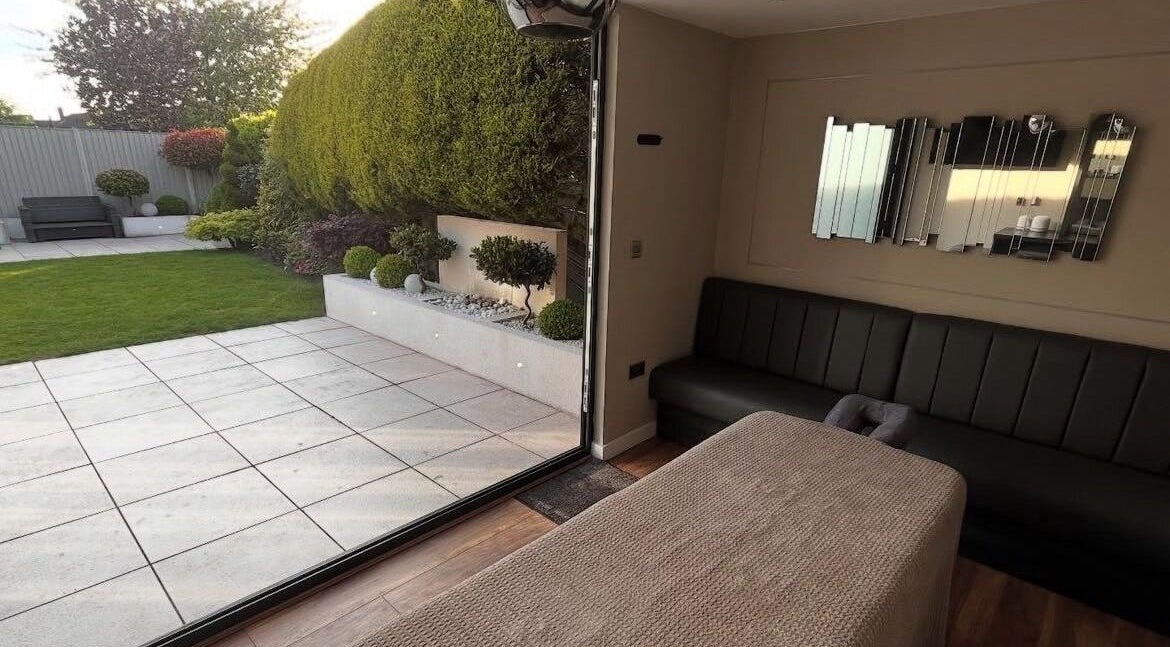 Relaxing massage room at Massage Therapy by Nicola in Chorley, England, GB with garden view.