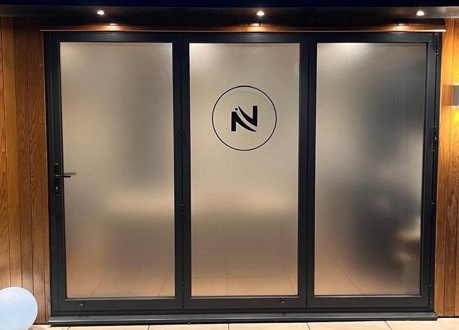 Elegant glass door entrance at Massage Therapy by Nicola, Chorley, England, GB, offering a tranquil ambiance.