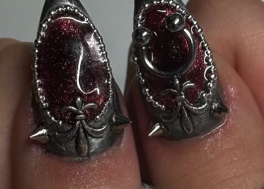 Unique gothic nail art with metal details at Byhollie in Rochdale, England, GB.