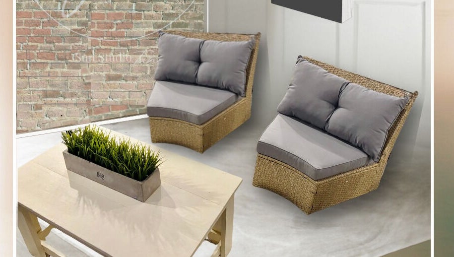 Relaxing seating area at Sun Studio Tan, Columbus, Ohio, US with wicker chairs and modern decor.